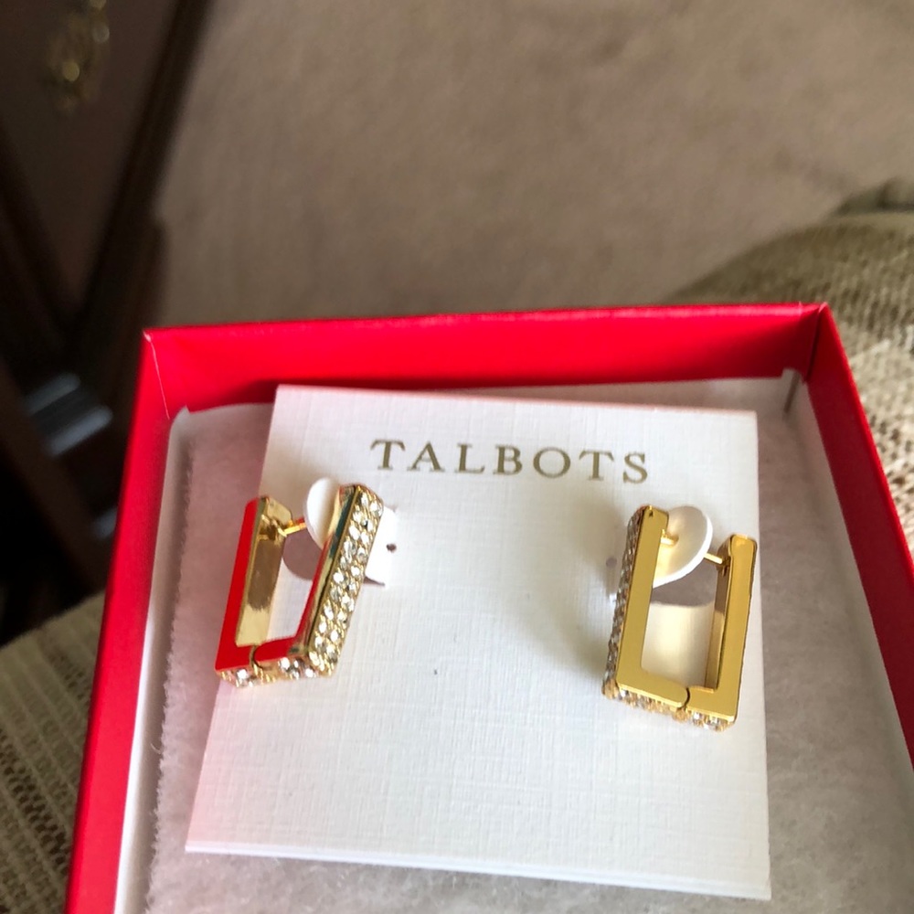 Pierced earrings. Gold with sparkly stones.